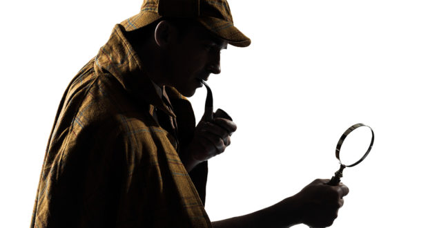 sherlock holmes silhouette in studio on white background