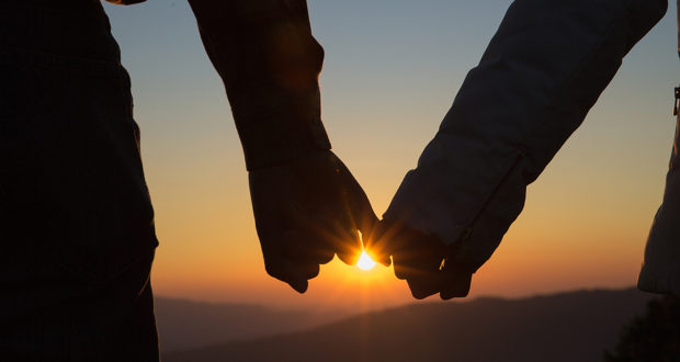 Couple In Love, Focus On Hands, Man And Woman Tourists In The Mo